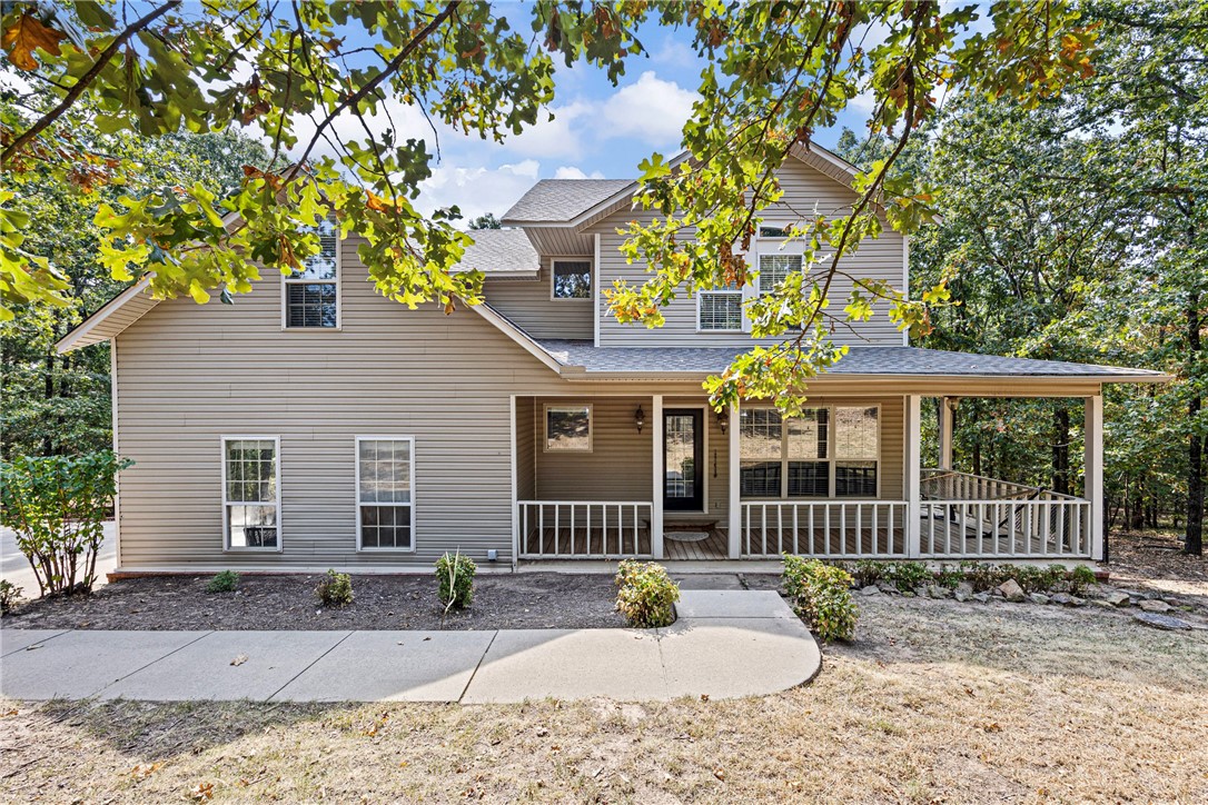 Move-In Ready Home, conveniently located just minutes from I-40 and close to all the amenities Morrilton has to offer, this beautifully maintained home offers the perfect blend of comfort and convenience. A new roof in 2024 and a full HVAC service completed in 2025 provide peace of mind for years to come. Inside, you'll find hardwood floors throughout, complemented by tile bathrooms for easy maintenance. The main level boasts 9-foot ceilings and a large bedroom complete with a luxurious soaking tub, separate shower, large walk-in closet, and a half bath for guests. Upstairs, you'll discover three bedrooms with vaulted ceilings, a full bathroom, and a versatile bonus room—perfect for a home office or playroom. Additional features include a dedicated laundry room with a fold-up ironing board, screened-in back porch and a large, fenced backyard, and an attached two-car garage.