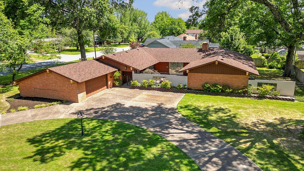 Welcome to this charming, beautifully and unique property in the heart of Springdale. Nestled on a peaceful 1-acre corner lot with mature trees, this home offers both space and privacy. Inside, youāll find high ceilings, fresh paint, and a 2020 remodel that includes a new roof, updated systems, two AC units, a water heater with a recirculation system, and full electrical update.
Enjoy three remodeled bedrooms, two updated bathrooms, solid interior doors, and generously sized closets. The home also features a private mother-in-law suiteāperfect for guests or extended familyāa welcoming front courtyard, backyard patio, new landscaping, and a spacious walk-in pantry.
The oversized garage includes built-in storage and a dedicated workspace. All of this just 5 minutes from I-49, schools, the hospital, and local businesses. Donāt miss out on this rare find!