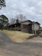 Gorgeous open floor plan 3-bedroom 3 bath home on 1.5 acres. This home has the feel of country living yet close to town and lake Dardanelle. Living Room upstairs features a beautiful fireplace open to the kitchen/ dining area.Downstairs features another bonus room area with built in shelving.Enjoy your evenings on the back deck relaxing overlooking the large back yard.