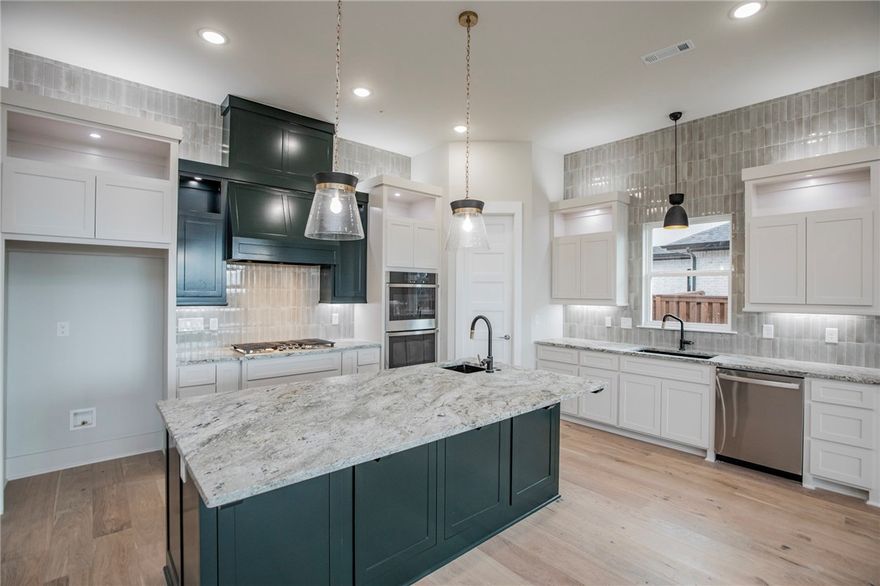 $18,200 PAID- $15,000 Buyer Incentive from Builder & $3,200 if you use the preferred lenders. Located in Scissortail's gated community this masterpiece of design & luxury, is a testament to impeccable taste. The heart of this haven is undoubtedly the chef's kitchen, sprawling island, vegetable sink, 5-burner gas cooktop, double ovens, granite counters, walk in pantry & stainless-steel appliances. Living room centers around a tile gas fireplace, enveloped by oversized windows that bathe the space in natural light. Adjacent, the dedicated dining area is positioned for a seamless flow. Retreat to the primary suite, where oversized windows invite in sunlight & spa-inspired bath with a walk-in tile shower featuring double showerheads, soaking tub, double sinks & walk-in closet with direct access to the laundry room. Study with French doors & additional main-level bedroom offer versatility. The upstairs reveals a generous bonus room with a wet bar. Enjoy the oversized covered patio overlooking the fenced in backyard.