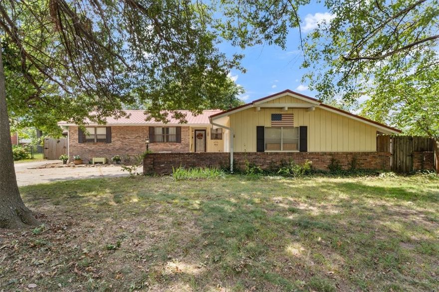 Updated 3-bedroom, 1.5-bath home with modern comfort and character. The remodeled kitchen pairs granite countertops with a farmhouse sink, pantry, and newer appliances—perfect for everyday living or entertaining.
Cozy up in the den with a gas fireplace and updated windows (2017) or gather in the dining room with its handmade cedar bar. The main bedroom has a convenient half bath, while the updated full bath features a walk-in shower.
Step outside to a covered patio with wood-burning fireplace and 220 outlet—ideal for a hot tub. Electrical outlet in shed, 2-car garage, and side carport complete this move-in ready gem.