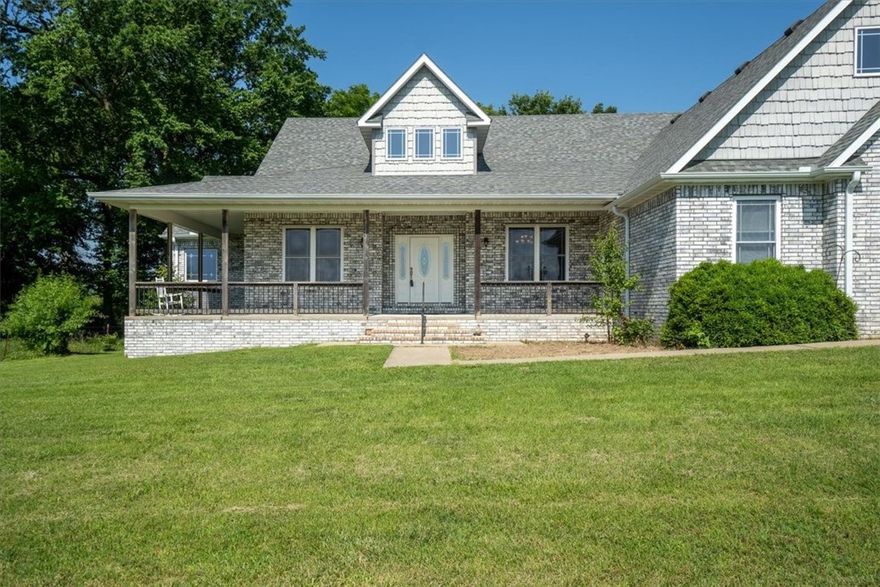 Great opportunity to own a beautiful home and amazing shop on 40.33 acres just 10 minutes from I-49 making it convenient to most of Northwest Arkansas! This property could be developed as a horse farm, or just a beautiful estate. The house features a large covered front porch, perfect for sipping your coffee in the morning as well as a covered back patio perfect for outdoor entertaining. This home has an open concept, beautiful hardwood floors, granite kitchen countertops, 5 bedrooms and formal dining room. Come see everything this property has to offer! The large 2400 square foot, 5 bay shop is also perfect for whatever your needs may be, from storage, to a workshop, to a gaming area, etc., it's truly worth a visit to see all it has to offer. The land is primarily pasture with just a few acres of woods.