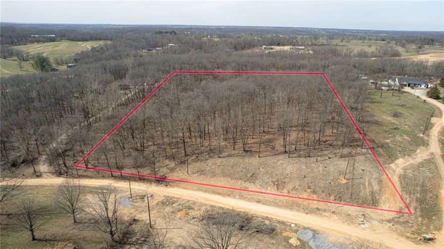 Prime 6.46 acre tract near XNA Airport and the highly anticipated Highway 612 expansion, offering incredible accessibility. With water available at the street, this property is ready for your dream home. Nestled in the heart of NWA, enjoy the perfect blend of privacy and convenience while being just minutes from all the attractions that make NWA special. Don't miss this incredible opportunity to build in a sought-after location!