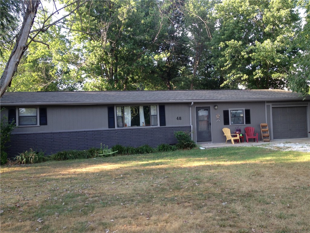 Cute starter home with very large living room and also spacious bonus room presently used for den. Fenced backyard with concrete patio and storage building. Low traffic street and good neighbors.
71b south into West Fork, Mecca is on the right before you get to the Arvest Bank, house is around the curve on the right!