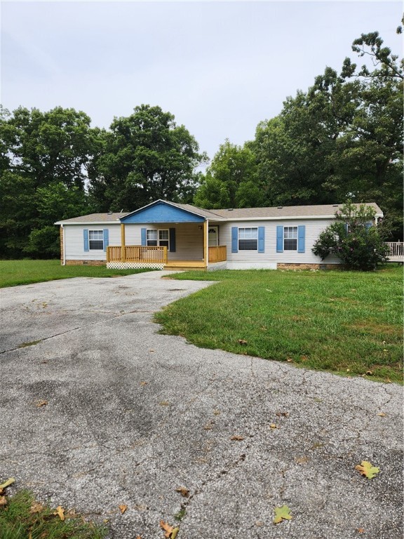 Lease $1550.00 Deposit $1550.00 Large 3bedroom 2 bath double wide. Large kitchen, dinning room and living room and even a screened in sunroom. Sitting on approximately 4.85 acres with a garage/workshop. Beautiful country views. Pets negotiable with a $300.00 refundable pet deposit and $ 50.00 Per month pet rent. You will need mowing equipment as the tenant does mow the property. All applicants 18 and over, $35.00 credit/criminal history fee. Agent owned property, leased by property management