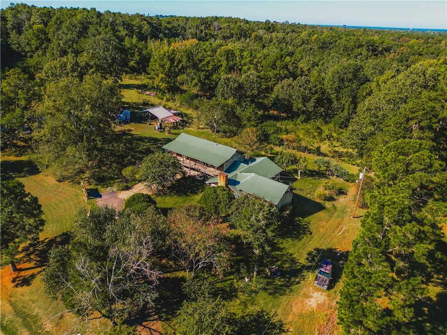 If you’re looking for privacy, space, and opportunity, this 23-acre gem just outside the Monticello city limits could be your perfect match! Nestled in a peaceful, wooded setting, this property offers a rare combination of seclusion and convenience – only minutes from town, yet far enough to enjoy the quiet of the countryside.