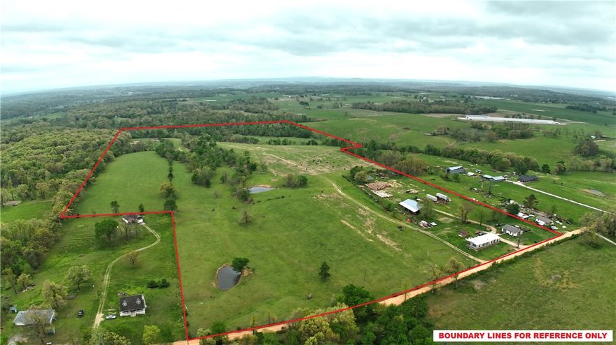 Home located on an impressive 71 acres in a highly desirable & rapidly growing area, offering the perfect blend of modern comfort and peaceful rural living. The spacious living room creates a warm and inviting atmosphere, highlighted by a cozy fireplace and enhanced with elegant crown molding. The kitchen is thoughtfully designed for both living and entertaining, featuring stunning stone countertops, a stylish backsplash, & a custom range hood. A large island provides ample space for meal prep and gathering, while the kitchen bar adds additional seating and functionality - all accented w/ refined crown molding. This home includes three well-appointed bedrooms, including a private primary suite complete w/ its own ensuite bathroom. The ensuite offers a relaxing retreat w/ a soaking tub, a beautifully tiled walk-in shower, & upscale finishes throughout. With expansive acreage and a location in a thriving, growing community, this property presents a rare opportunity for both comfortable living and long-term potential.