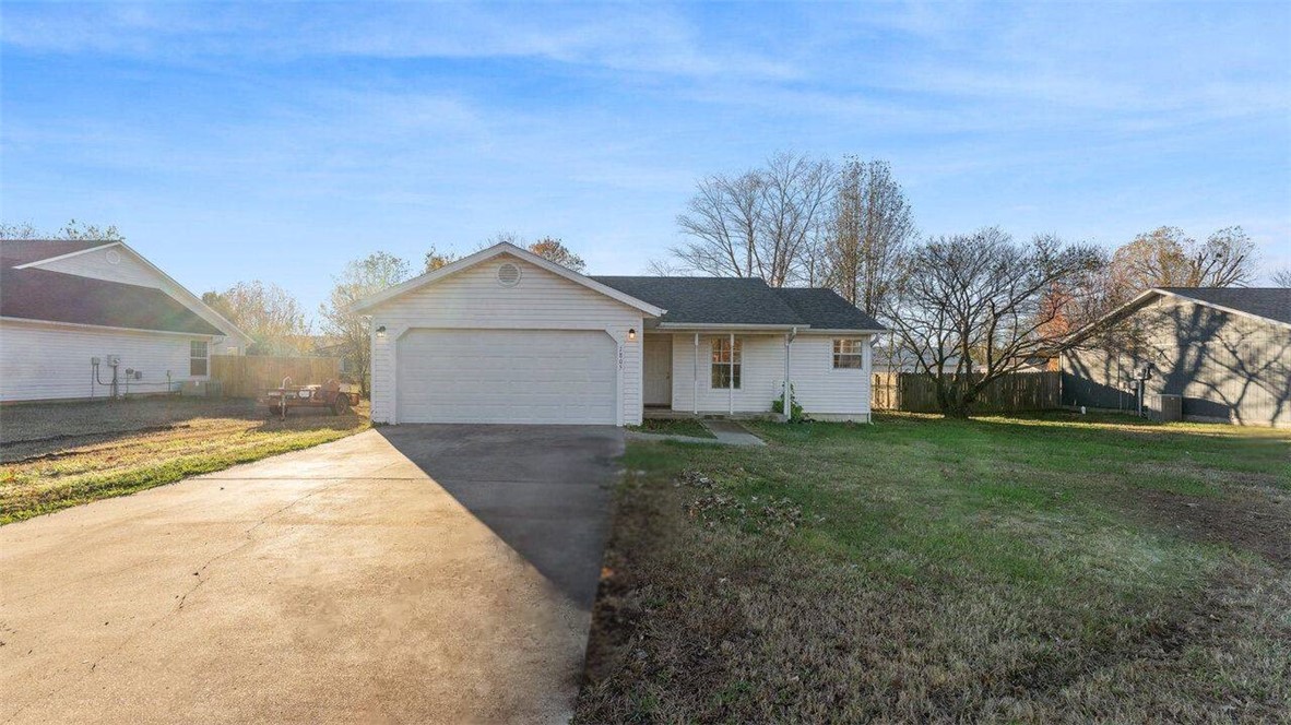 Welcome to this beautifully updated 3-bedroom, 2-bathroom home, just 15 minutes from the University of Arkansas. Set in a peaceful neighborhood, this property offers a blend of comfort and modern convenience. Everything important is less than 5 years old! Enjoy fresh flooring, a newly painted interior, a new garage door, and an inviting deck, perfect for relaxing outdoors. With a water heater, HVAC, and roof all updated within the past 5 years, you can move in with peace of mind and minimal maintenance.