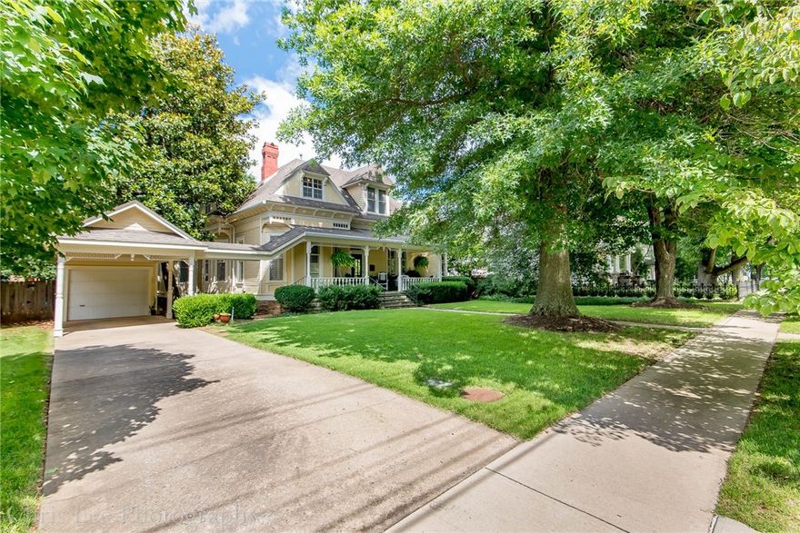 Stunning home located in The Washington Willow Historic District. This property has Turn-Of-Century traditional feel w/MANY Updates. Walk into the grand oak entry & enjoy the 6 pieces of original stained glass throughout the home. This home features hardwoods, fireplaces, tall ceilings, updated kitchen w/granite, huge master closet, original doors, large windows, wood trim, pine flooring on 2nd level. You’ll enjoy the covered front porch, mature trees, large fenced in backyard w/stone patio & more.