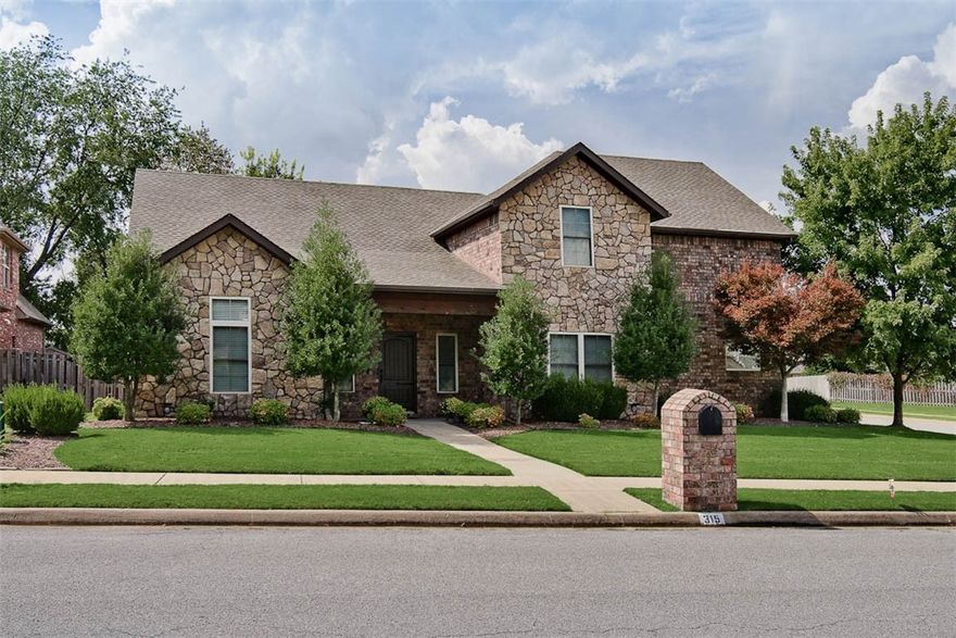 Perfectly located just minutes from Coler Creek Preserve, 8th Street Gateway Park, Downtown Bentonville, & the new Walmart Home Office, this charming home sits on a corner lot in the desirable Windsor Manor Subdivision. Inside, vaulted ceilings, large windows, and an open layout create a warm & inviting atmosphere. Thoughtful updates include new flooring, elegant wall moldings, and fresh paint throughout. The fully remodeled primary suite features an oversized shower, dual vanities, & a stunning custom closet. The gourmet kitchen is equally impressive with new Taj Mahal quartzite countertops & stylish backsplash, alder cabinetry, a deluxe double oven & 5-burner gas cooktop. Upstairs, 2 bedrooms with ensuite baths provide comfort and privacy, while a spacious 3rd bedroom/bonus room & half bath adds versatility. Designed for year-round enjoyment, the screened porch features a wood-burning fireplace & built-in grill overlooking the landscaped backyard. Amazing oversized 3 car garage with 240v outlet for EV charging!