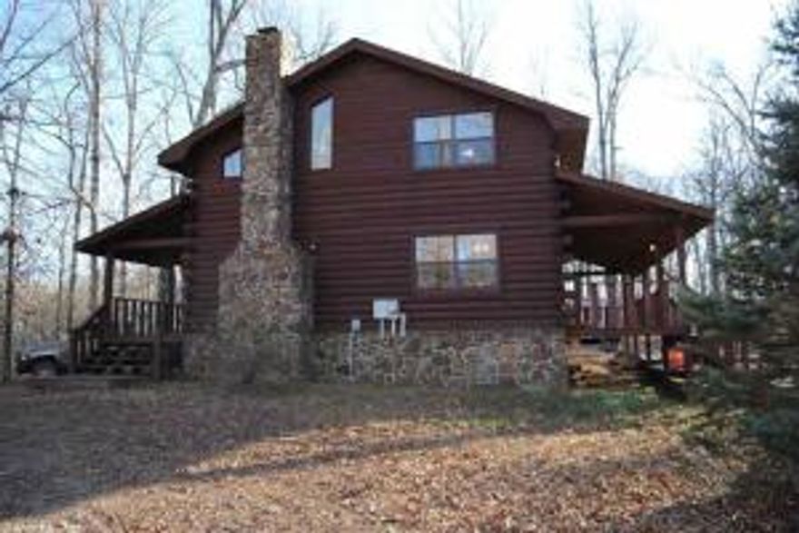 CALLING THIS LOG HOME ''ELK HEAD LODGE, NESTED ON 40 ACRES JOINING THE BUFFALO RIVER 1600' ON ONE SIDE AND 1243' ON OTHE SIDE, HAS A VIEW OF THE RIVER-BEAR CREEK AND BELOW GILBERT . A RAW FIND, HAS LOTS OF MARKATABLE TIMBER NOT BEEN CUT IN 40 YEARS , WHITE OAK TIMBER AND HARD WOOD, BIG NATIVE STONE FIREPLACE, 3 OR 4 BEDROOMS , ONE DOWN STAIRS, ALL WOOD INSIDE AND LOG OUTSIDE, 2 FULL BATH FURNISHED OR UNFURNISHED, VERY PRIVATE AT END OF ROAD, COVERED PORCHES, 80 GALLON HOT WATER HEATER, LOOKING FOR A LOG HOME