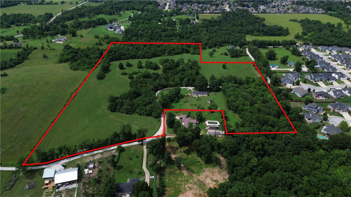 Location, Location, Location ā 23.40 Acres nestled in one of the fastest developing areas in Northwest Arkansas and this property adjoins Hyde Park. Investors and developers take a strong look at this golden opportunity for a once in a lifetime property. Or, you could purchase to have a beautiful property to enjoy while the property values continue to rise. The opportunities for this property are endless.
Also listed as land ML1312218