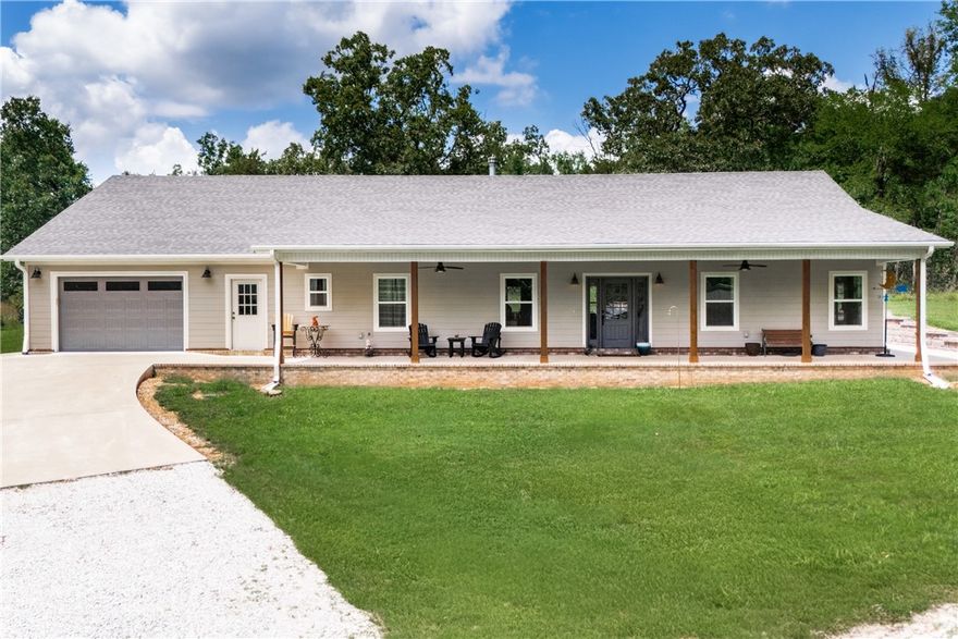 17706 Beav O Rama Rd offers rare tranquility just outside Fayetteville. Private, spacious, and full of potential—perfect for buyers seeking a quiet rural setting with room to grow. Includes a 5-stall barn ideal for a hobby farm, chickens, or small ponies. Also features a shop with electricity—great for projects, storage, or equipment. Minutes from Beaver Lake and the Goshen Farmers Market. Excellent opportunity for gardening, homesteading, or a peaceful retreat. Easy access to town, but feels a world away.