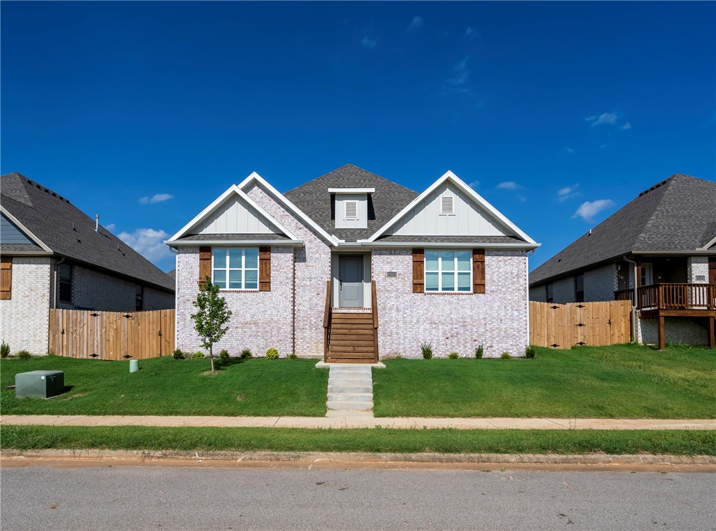 Charming and move-in ready. This well designed home features a light brick exterior, inviting front steps, and a fully fenced yard. Inside, enjoy the seamless flow of an open concept living area with wood-look tile flooring, tray ceiling, and a cozy gas fireplace. The modern kitchen boasts granite countertops, a spacious island with pendant lighting, stainless steel appliances, and a pantry. The primary suite offers comfort and style with a tray ceiling, plush carpet, and a spa-like en-suite featuring a large tiled shower and double vanities. Additional highlights include a two-car rear-entry garage, covered side porch, and low-maintenance landscaping. Located in a desirable neighborhood with a smart, functional layout that fits a variety of lifestyles. Seller offering $3,500 towards Buyer's Closing Costs and Prepaids.