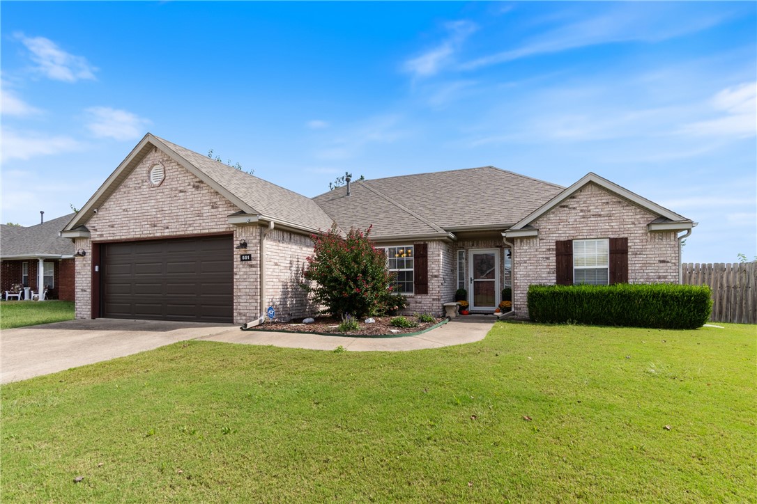Beautiful ¾ brick home featuring split floor plan and aesthetically pleasing updates throughout. Step inside to find brand-new engineered hardwood flooring, fresh bright paint, new granite countertops, and a sleek glass-top range in the kitchen. The refrigerator, washer, and dryer all convey, making this home move-in ready. You will enjoy the way the soaring tray ceilings, wood blinds, and natural light bring life to this elegant, yet casual design. Recent improvements include a new garage door and motor for added peace of mind. With style, function, and comfort combined, this home is ready to welcome its next owners. Close to Bentonville West, Centerton Gamble Elementary and Lifeway Christian School. Only 5.5 miles to Walmart Headquarters and 7 miles from Crystal Bridges Museum. Open field to the back of property and fish hatchery to the south makes this feel rural while close to amenities.