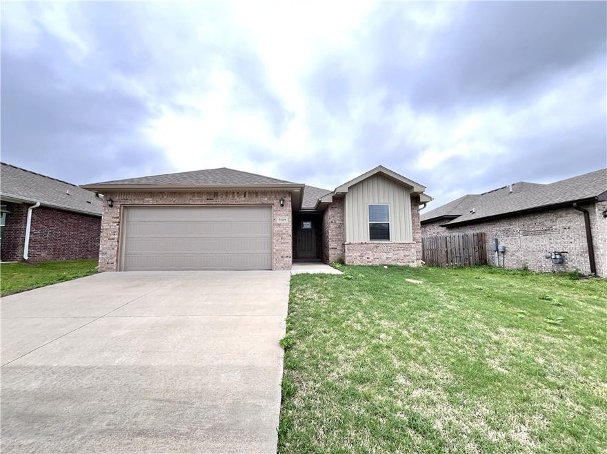 This well-maintained 2022-built home at 5909 NW Reynolds Street offers 1,789 sq ft of single-level living with an open concept layout, granite counters, electric fireplace, and walk-in closets. The oversized kitchen is great for entertaining, and the primary suite connects directly to the laundry room for added convenience. The home features a 2-car garage, fenced backyard, and is located in the Bentonville School District. Pet-friendly rental.