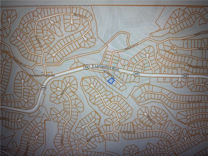 Discover the perfect setting for your next Bella Vista escape on this beautiful lot along Flaxton Drive. Nestled in a peaceful, wooded setting, this property offers the ideal blend of privacy, natural beauty, and convenience. The gently sloping terrain provides flexibility for your dream home design—whether you envision a modern retreat or a cozy cabin tucked among the trees.
Outdoor enthusiasts will love the location: just 1/3 of a mile from the Back 40 Trailhead, giving you immediate access to one of Bella Vista’s most popular trail systems with miles of world-class mountain biking and hiking. You’re also just a short distance from Lake Ann, where you can enjoy fishing, paddling, and serene Ozark views.

Located minutes from Bella Vista’s additional lakes, golf courses, and community amenities, this lot offers both recreation and relaxation in one of Northwest Arkansas’ most sought-after areas.
Come walk the property and imagine the possibilities—your Bella Vista lifestyle starts here.