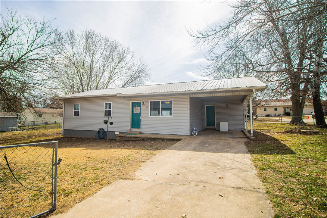 An amazing 3 bedroom 1 1/2 bath home on .36 of an acre fenced all the way around lot in beautiful Boone County Arkansas. This home is next to the Parks and Rec baseball complex, close to schools, and directly off of Industrial Park. Come see this property!!
