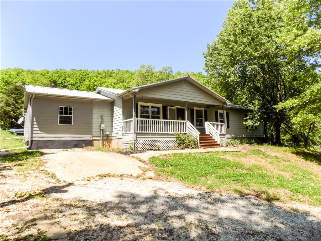 Your Private Oasis Awaits! This 39-acre wooded retreat comes complete with a spacious 4-bedroom, 2-bathroom home featuring two bonus rooms for endless possibilities. Whether youāre looking for extra space for a home office, hobby room, or guest quarters, this home has you covered.
The surrounding wooded acreage is a hunter's paradise, teeming with wildlife and perfect for outdoor enthusiasts. Picture yourself exploring trails, setting up the perfect hunting blind, or simply enjoying the tranquility of nature. With this much space, the potential is limitlessāexpand, build, or simply enjoy the privacy and serenity.
Conveniently located just 30 minutes to Branson and 10 minutes to Harrison, youāll have easy access to entertainment, dining, and shopping, while still enjoying the peace of country living.
Donāt wait! A property like thisāwith a spacious home and 39 acres of wooded paradiseādoesnāt come around often. Call today to schedule your private tour and make this dream property your own!