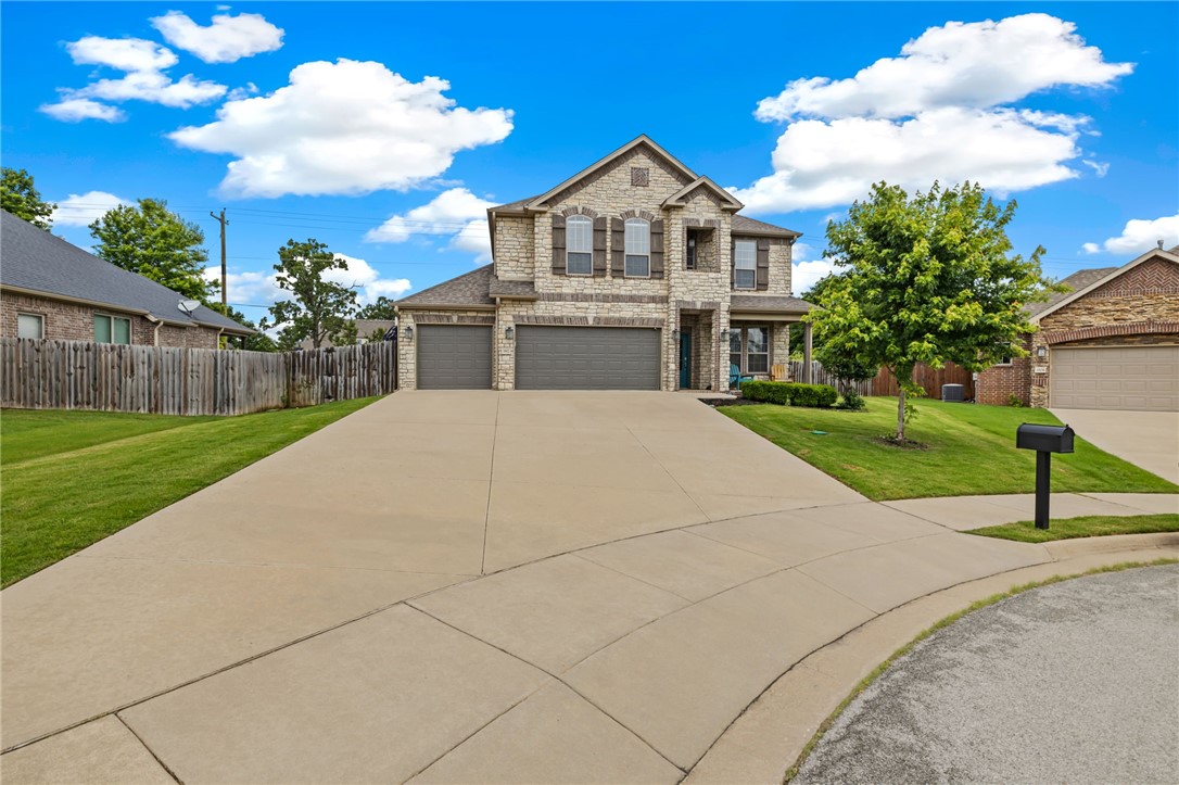 Discover the perfect blend of convenience & comfort in this stunning 4BR/2.5BA-2,214SF home located just 3 Mi. from the I-49 corridor in the sought-after Brentwood subdivision. Key Features: OPEN FLOOR PLAN: Enjoy a spacious layout w/abundant natural light, perfect for modern living. MAIN LEVEL LIVING: Primary suite plus an additional bedroom on the main floor for ease & accessibility. COZY FIREPLACE: Relax by the gas log fireplace in the inviting living room. GOURMET KITCHEN: Features a spacious kitchen w/ample countertop space & a central island, ideal for meal prep & entertaining. UPSTAIRS RETREAT: Includes a versatile living/flex area, a full bathroom & two large bedrooms, perfect for family or guests. OUTDOOR HAVEN: Fully fenced backyard w/beautiful landscaping, a covered patio & a storage building on a concrete pad. COMMUNITY AMENITIES: Brentwood subdivision offers a community pool & playground space for residents to enjoy. Donāt miss out on this incredible home that has it all. Schedule your tour today!