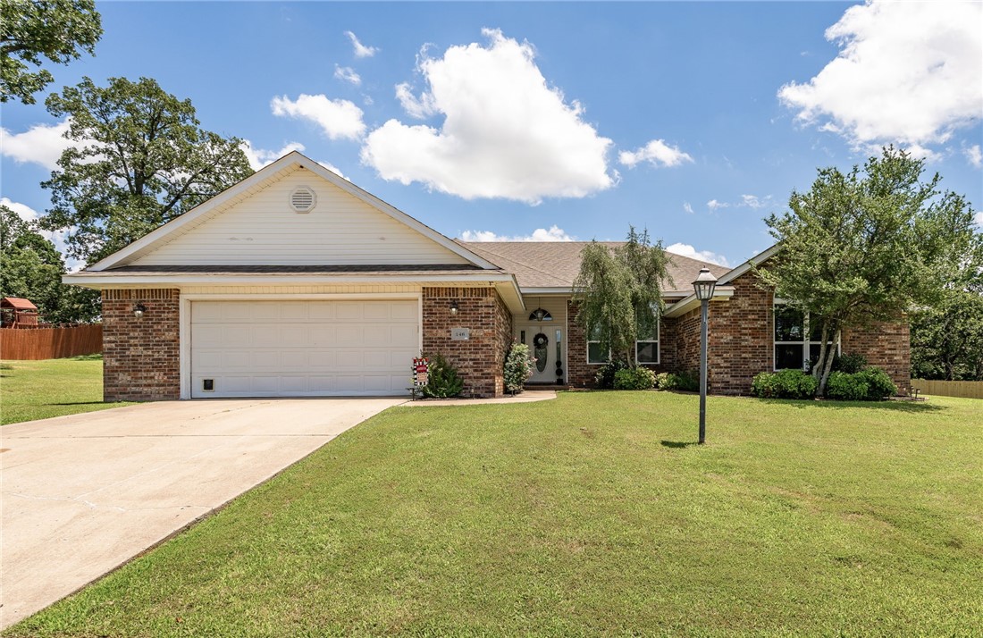 Move-in ready brick home on nearly an acre (two lots) just East of Alma. Recently remodeled kitchen with quartz countertops, large under mount sink, stainless steel appliances, fresh paint and a large walk-in pantry. Some new light fixtures. Spacious rooms throughout. Walk -in closets. Roof on the home is approximately 2 years old. Oversized 2 car garage with electric. Walking distance to River Valley Golf.