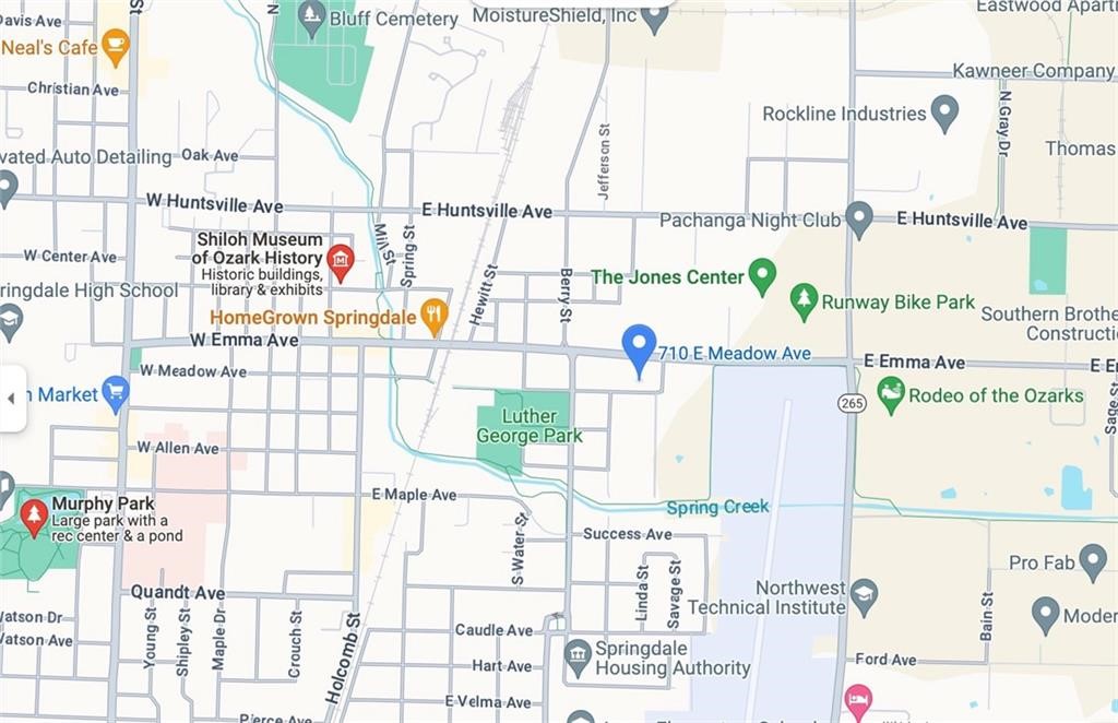 .25 acre of developmental potential directly in the middle of everything going on in Downtown Springdale.