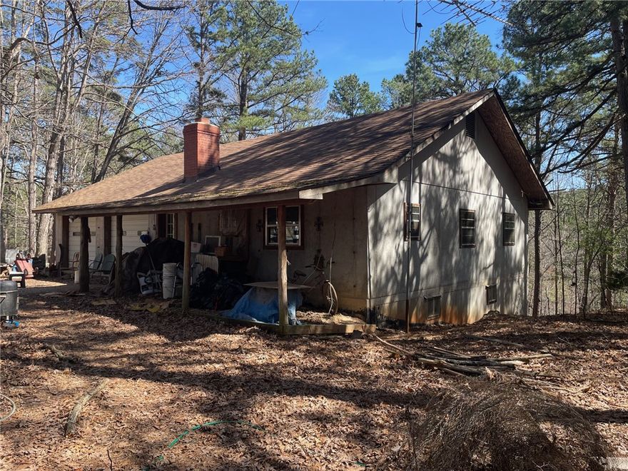 Great opportunity to buy a Concrete Home with a basement and almost 16 acres. Upper level has 576 heated area of living quarters along with a two car garage. Lower level is unfished full basement with a two car garage. Lower level could be made into living quarters as well. Main level has one bedroom , one bathroom, living area and a kitchen. Home has a good water well. House is easy to heat and stays cool in the summer. 8 inch concrete walls. Lots of opportunity here. Old cars and scrap metal located in the yard and on the property will be sold at Auction on May 9.