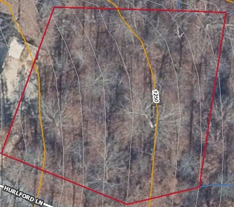 Welcome to this beautiful wooded lot located in the serene and sought-after Bella Vista community. Nestled in the Ozark Mountains, this location offers an ideal setting to build your dream home. Surrounded by mature trees, the lot provides both privacy and the natural beauty that Bella Vista is known for.
The lot is situated in a cul-de-sac on a quiet, paved road, offering easy access while maintaining a peaceful, rural atmosphere. At 0.36 acres, there's plenty of space to design your perfect retreat. Whether you're looking to build a cozy cottage or a larger family home, this lot provides flexibility and room to grow. Enjoy the stunning surroundings of Bella Vista including nearby Branchwood Nature Trail.
This property had a soil percolation test completed with approval of a 3 bedroom property. Don't miss out on this fantastic opportunity to own a slice of Bella Vista! Contact us today for more information.