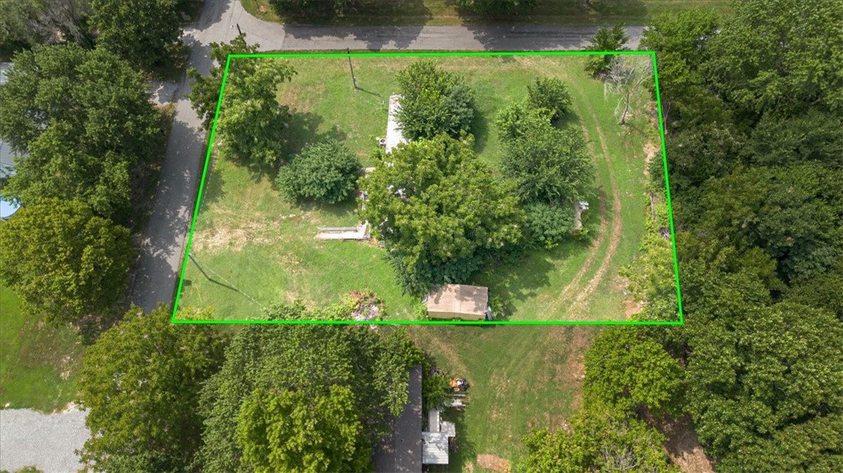 Mobile homes to be sold or moved separately. Each Lot on a spacious 0.32-acre lot, present an excellent opportunity for comfortable living and future development. Both come with new surveys, offering added value for the new owner. The combined 0.64-acre property can be split in multiple ways, providing flexibility for future development. This is a fantastic chance to enjoy a peaceful setting with ample room to grow and build upon.