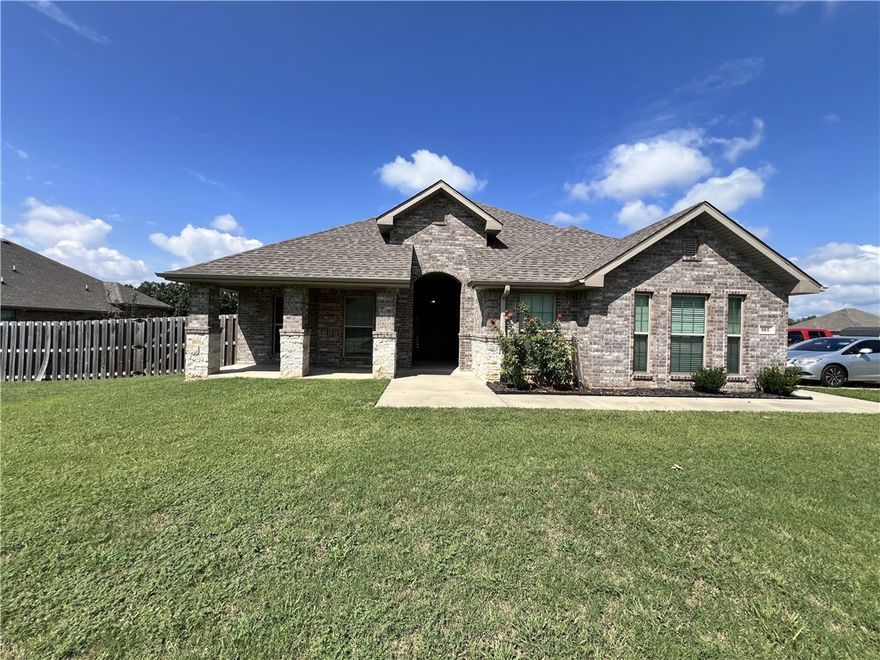 Welcome home to this spacious 4-bedroom, 3-bath retreat in the heart of Pea Ridge! With over 2,000 sq. ft., this home offers the perfect blend of comfort and style. The open layout makes gathering with family and friends a breeze, while the kitchen—with its modern appliances and generous counter space—flows beautifully into the living areas. Natural light fills the home, highlighting the mix of wood, tile, and soft carpet floors. The primary suite is a relaxing escape with a private bath and roomy closet. Step outside to enjoy your yard, perfect for morning coffee or evening playtime. An attached two-car garage adds everyday convenience. Tucked into a welcoming neighborhood just minutes from schools, parks, and Bentonville amenities, this home truly lets you enjoy the best of Northwest Arkansas living. —move in ready!
