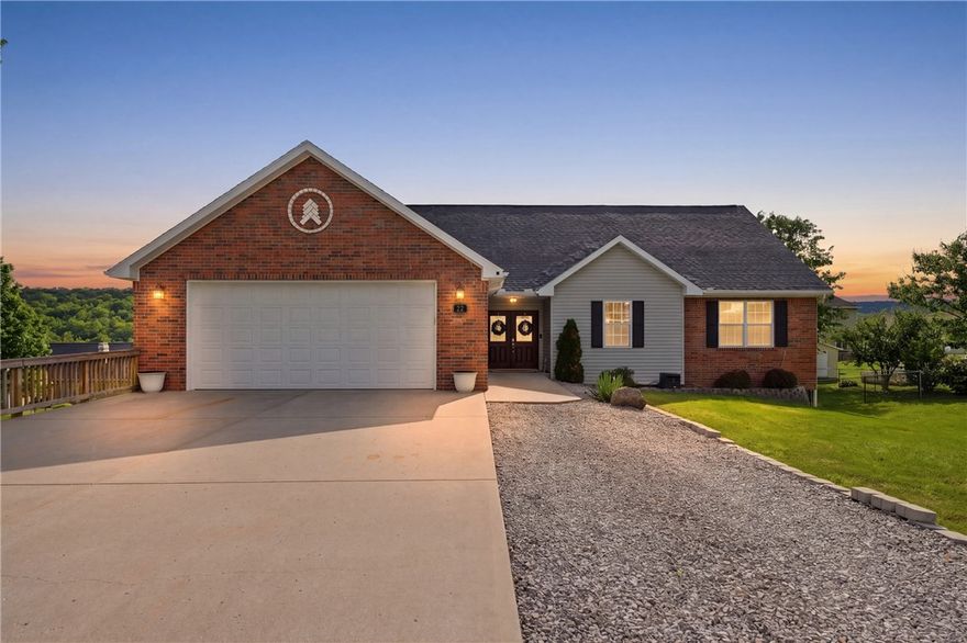 Welcome to 22 Bandy Dr in Holiday Island—a stunning home offering space & breathtaking year-round lake views in one of NWA’s most sought-after communities. This expansive 3,388 sqft home features 5 beds & 3 full baths, providing plenty of room for family, guests or even a home office setup. Designed for functionality, you’ll appreciate laundry rooms on each floor & a thoughtful layout that accommodates both everyday living & entertaining. The finished walk-out basement adds versatility, complete with an attached workshop—perfect for projects or storage. Inside, enjoy cozy evenings by the fireplace, & upgrades like a zoned, dual fuel HVAC system ensure efficient comfort. Also featuring a whole-home reverse osmosis water filtration system with water softener, offering enhanced water quality. Located just mins from Table Rock Lake, golf courses, & community amenities, this property is ideal as a full-time residence or vacation getaway. Don’t miss your chance to own a well-appointed home in the heart of Holiday Island.