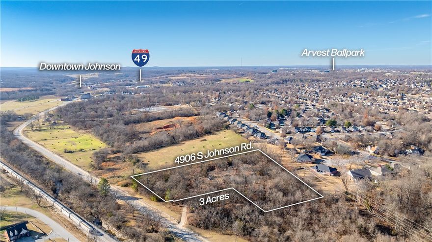 Development Potential - this means that zoning and usage is too be determined by the future owner and the City of Johnson.  A creative developer is required.  Location is the key.  Walk to Johnson Square.  Multi-family Townhomes?  Condo's? Commercial is possible pending City approval. 
  Seller would like to hear from all interested parties - Seller has lived on the property since 1989.