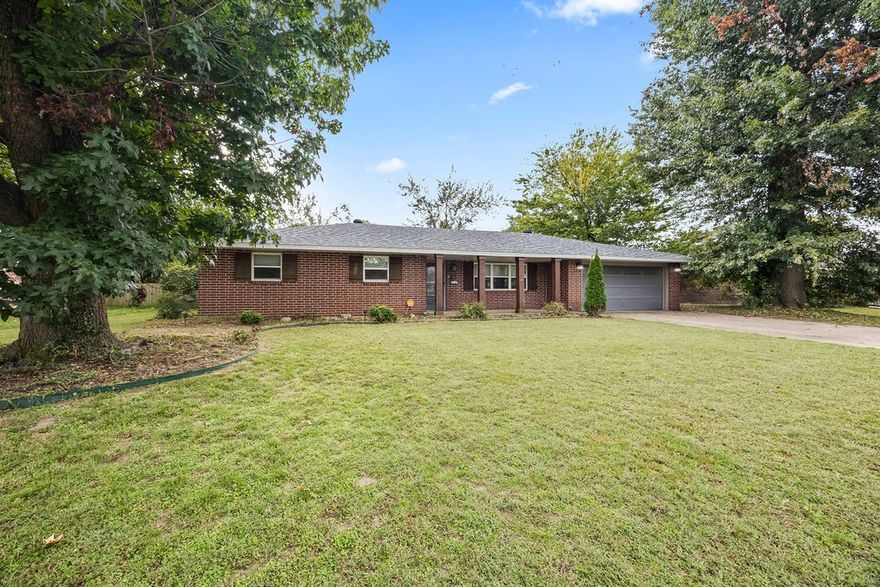This home features a spacious great room with fireplace, a large laundry room, updated floors and paint, a new roof in 2025, HVAC new within last 2 years. Mature trees with fenced in backyard. Great first time home buyer or investment home.