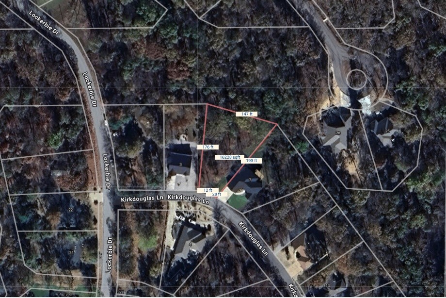Quiet and secluded Bella Vista building site ready for your home. Loch Lomond Lake nearby. Plenty of Golf and Country Club amenities right around the corner. Water and electric at street.
