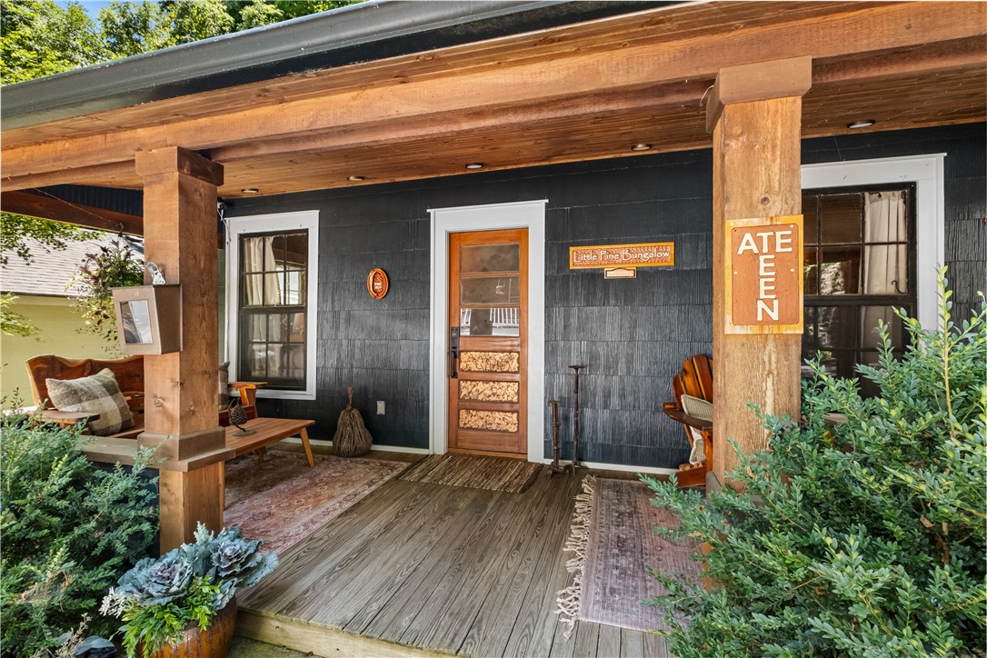 This stunning early 1900s cottage has been completely remodeled with all the modern conveniences packed into a vintage home. Just a few steps from Spring Street, you can't beat the location to experience downtown Eureka living. The front porch is a fun spot to relax and visit with neighbors and tourists. If you want privacy you can enjoy the back patio that's a secluded grotto with a beautiful stacked stone wall. The front door opens into the living room with 10-foot bead board ceilings and beautiful heart pine floors. The kitchen has tile floors, granite counters and new stainless steel Cafe appliances. Tile continues into the sunroom with a gas-log fireplace and two double doors that open onto the patio. The home was two spacious bedrooms, and the primary bedroom as a walk-in closet that is rare for a vintage cottage. The full bath has a tiled shower with a rain head and a laundry closet with a stacked washer and dryer. Off-street parking. Easy walk to your favorite restaurants and shops. Not zoned for VRBO.