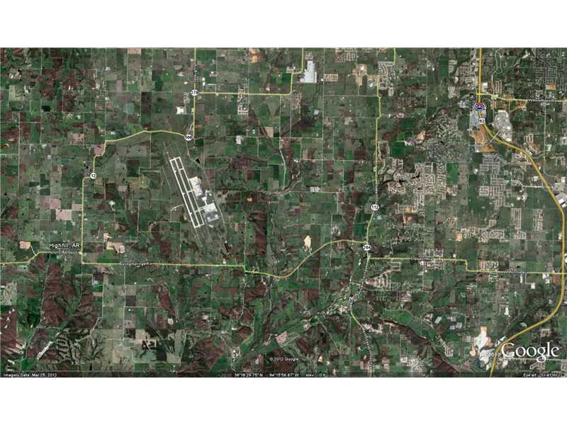 Tract of land on the west side of XNA, approximately 498 acres. Not zoned specifically at present.
