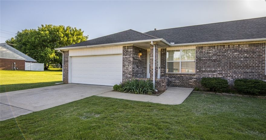 Well maintained Duplex in Lowell. Just minutes from I-49 and 71 business. 2 bedroom 2 bath duplex has vinyl plank wood style flooring throughout, walk in closets in both bedrooms, over sized utility room with lots of cabinets. Covered patio, Refrigerator included, lawn care included.