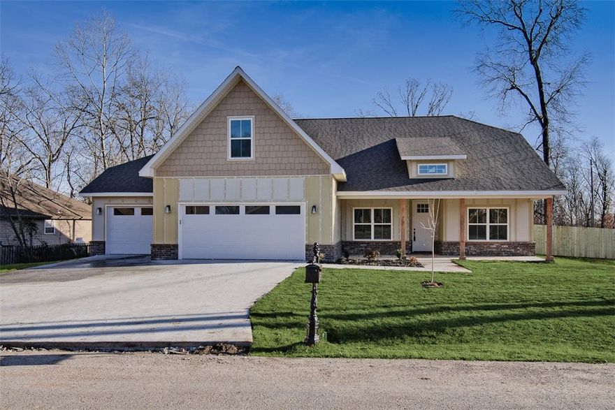 New construction on a flat .39 acre lot directly on trail with a wood privacy fence! Located a few minutes from Lake Ann and Metfield Golf Course. Featuring a spacious 3-car garage, 3 bedrooms + upstairs bonus room with full bath. The kitchen is equipped with a large island, floor-to-ceiling cabinets, 3 cm quartz counters, stainless steel appliances, and a gas range. The living room boasts a beautiful fireplace, exposed beams, a stunning cathedral ceiling, and hardwood floors which also extend into the primary bedroom. The primary bath features a luxurious soaking tub, separate vanities, and a huge walk-in closet with a custom tile shower. High-end finishes throughout. Bentonville schools. $3,500 in closing costs when using the builder's preferred local lender. Home is under construction. Front exterior will be painted Illusive Green (Sherman Williams). Approx completion date - 12/1/25