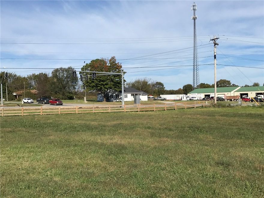 Bank owned 11+ Acres for sale on HWY 62. Great loacation with 4 lane hwy in front and a public road behind.  This property is located by a stoplight. Build your commercial retail center or divide for residential. Flat pasture ground right now zoned AGRI.  Already has a 35x100 Metal building on the property to use as an office or storage.