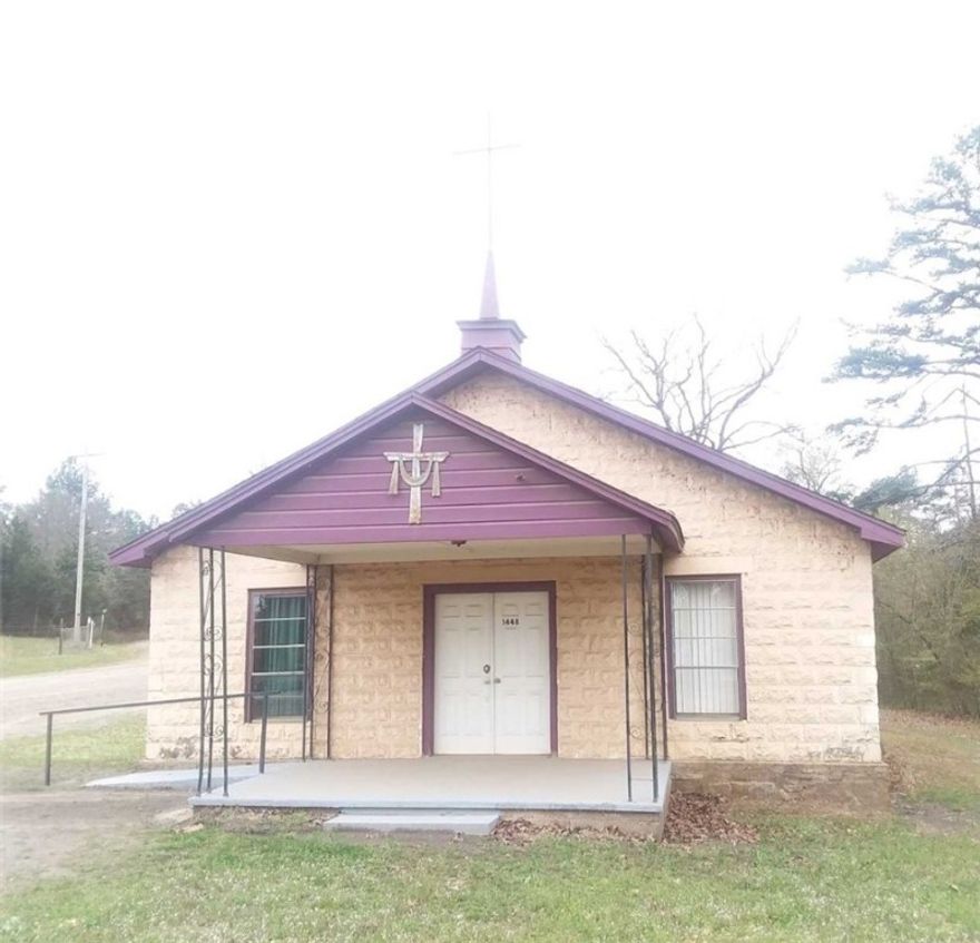 This 2 (+/-) acres has a church building that can still be used as a church or turned into a residential home. It has electricity at this time with 1 bathroom. The rest of the lot is partially cleared and flat. Call today for more information.