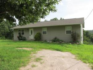 Newer home with 5 acres and paved road, nice kitchen and open living-dining area plus full unfinished basement for additional space. Basement includes garage & workshop area and lots of storage. Home has maintenance free exterior and rear deck with view. Land is part open and part wooded and located on paved county road in Bergman School District. Come see - you'll like this one!!