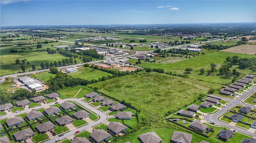 Major road frontage leading into Siloam Springs. A little more than 1 acre beside this tract which is currently under contract with major national chain. This tract is adjoining to the back portion (2.5 acres) which creates an L shape.