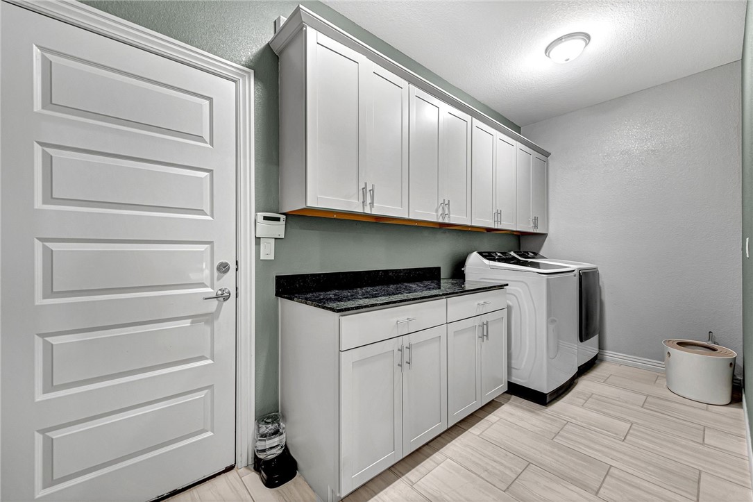 Welcome to 1514 Park Street—a move-in ready gem nestled in a highly desirable neighborhood in Lowell, with unbeatable access to everything Northwest Arkansas has to offer. This beautifully designed 4-bedroom home offers a bright, open layout with two bedrooms on the main level, a cozy fireplace in the living area, & a stunning kitchen featuring granite countertops, stainless appliances, gas range, and a walk-in pantry. The primary suite feels like a spa retreat, complete with a tiled walk-in shower, double vanities with a tile feature wall, & a large walk-in closet. Enjoy added convenience with extra cabinetry in the laundry room and ample storage throughout. Premium features include voice controlled light switches and programale thermostat. And the location? It’s incredible—just minutes to I-49, top-rated schools, The AMP, Pinnacle Hills Promenade, & some of the best shopping, restaurants, & entertainment in the region. This home checks every box & is move in ready —don’t miss your chance to make it yours!