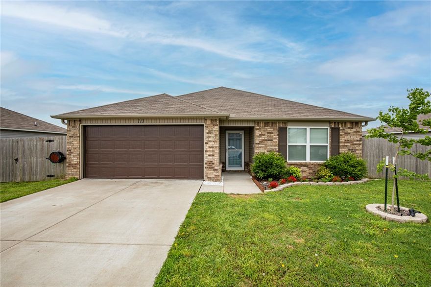Great home in Silver Meadows. 3 bedroom 2 bath home features open main living area with vinyl plank wood style flooring thru main area. Stainless appliances in kitchen, refrigerator included. Bedrooms are carpet. Master suite has large walk in closet. Fenced yard with covered patio, fire pit area and garden area.