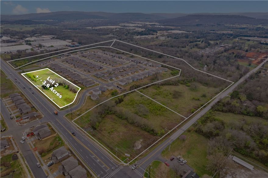 +/- 3.6 acres of LEVEL land with 790 feet of frontage on E 15th St in Fayetteville, Arkansas, which sees
+/- 16,000 VPD. Sewer, water, and electric are readily available on site or in close proximity. Positioned
in front of a recently constructed subdivision developed by a leading national builder. Partly zoned C-1
Neighborhood Commercial, which would make it a great spot for restaurant/cafe, retail and/or office
spaces, QSR, gas station, or Short-Term Rentals. Conveniently located just a short 5-minute drive to
Downtown Fayetteville and the University of Arkansas Campus. This parcel is strategically located
between two entrances into a new residential development enabling high exposure for a new retail
development or many other commercial real estate development opportunities. This lot is zoned Partial
NC and Partial C-1: C-1 - Neighborhood Commercial. This zone is made to provide convenience goods and personal services to people living in the surrounding residential area.