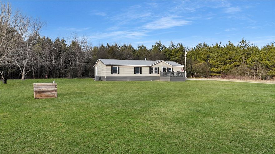 NEW FLOORS IN KITCHEN & DINING ROOM NOV. 2025!! 
This stunning 4-bedroom, 3-bath home has been beautifully renovated and is ready to impress! Featuring a cozy wood-burning fireplace, a spacious master bedroom with a huge walk-in closet, and inviting outdoor spaces including a charming front porch and a covered back porch perfect for entertaining. Outside, you'll find a 20x30 concrete pad with a basketball goal and a 10x12 metal shed for extra storage. Conveniently located just 13 miles from Mount Magazine Lodge, with Cedar Piney Lake, Spring Lake, Blue Mountain Lake, and Cove Lake all within 20 miles, this property is a dream for outdoor enthusiasts and those seeking a country retreat.