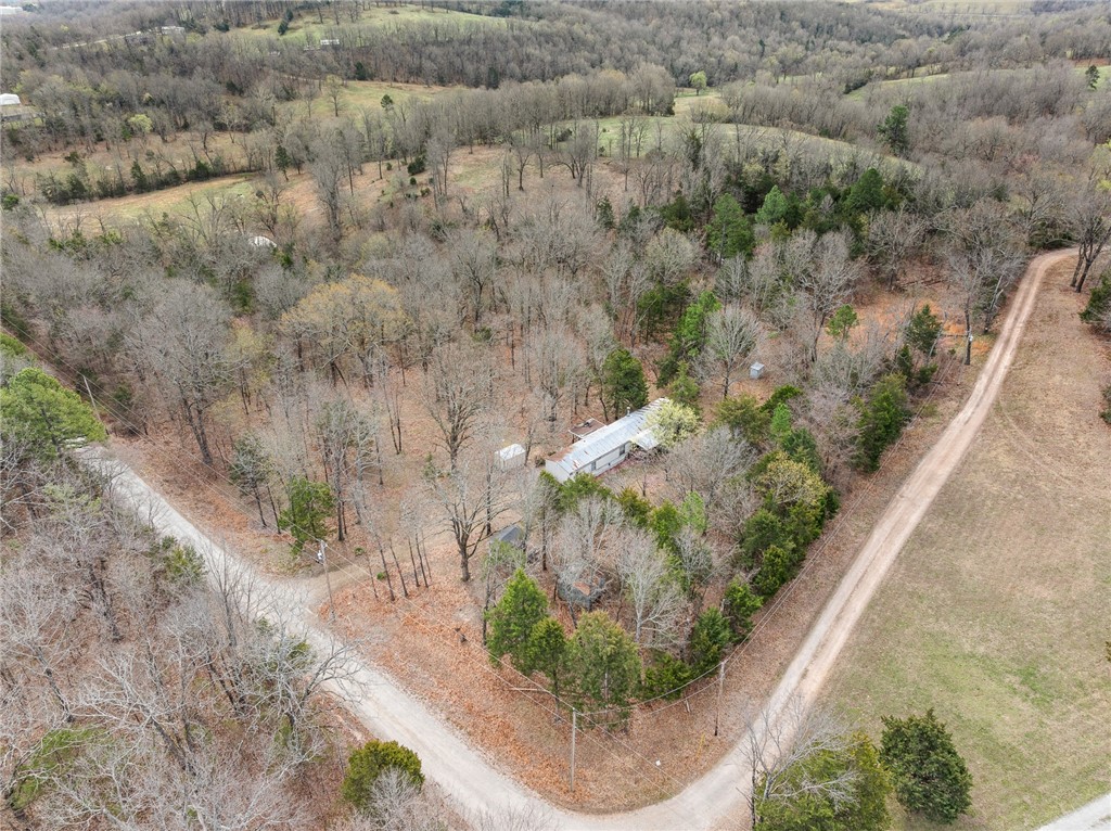 Looking for a little slice of country living? This 3 bed, 2 bath manufactured home sits on 5 beautiful acres and offers a great blend of comfort and potential. Inside, youāll find a spacious living room and a large kitchenāperfect for family time or entertaining.
Step outside and enjoy the peaceful views from your front or back deckāideal spots for morning coffee, sunset watching, or weekend grilling. The property also features a pond, an above-ground storm cellar, multiple outbuildings for storage or hobbies, and a second cleared building site ready for whatever you dream up next.
Whether you're looking to live simply, start a homestead, or just enjoy some fresh air and elbow room, this property is ready to welcome you home.
