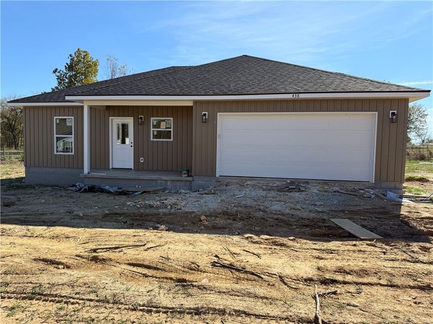 New construction home in the heart of the city!  Beautiful vaulted ceiling in the living area enhance the open concept.  Split floor plan, granite countertops and separate laundry add to the charm. Also, with almost a 1/2 acre lot, there's plenty of room for outdoor entertaining, garden spot or shop.  Add some fencing and you have a huge fur baby play pen.  Enjoy the morning coffee on the back patio while admiring the views. New private drive creates a sense of country living in the city.  To be completed December 1st and ready for holiday decorating.  Set your appointment today!