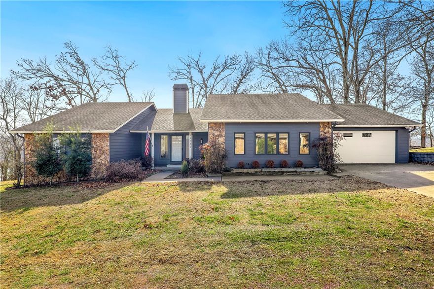 A house like this doesn't come on the market often! Lakefront with a private dock, yet only 10 minutes to Downtown Rogers. Fully renovated in 2020, this home has the benefits of a new construction with the character of an older home. Home has been used as a short term rental and can be sold fully furnished, making it a perfect turn key opportunity for someone to use as an investment or a second home. Walk down to the single slip private dock directly below the home, already set up with a lift. Permits to add a swim platform and add solar panels already requested and in the works! Come experience lake living and schedule in time to catch a sunset over the water.