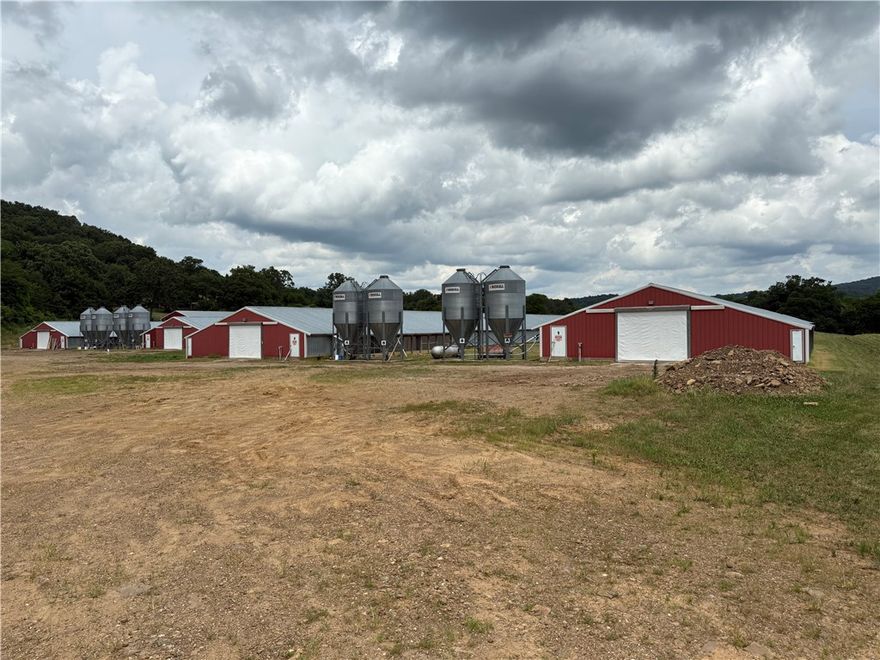 Exceptional opportunity to own a top-producing broiler farm in a prime West Fork location close to Fayetteville! This well-maintained operation features four (43’x500’) broiler houses, each equipped with Chore-Time 3 controllers, and the backup system was recently upgraded to a digital system. No upgrades needed. The farm consistently ranks among the highest-producing operations in the area, generating an impressive annual income of over $285K. The property also includes a spacious two-story home, perfect for an owner-occupant or farm manager, plus a 30’x50’ shop with electricity and a concrete floor for equipment storage and workspace. This is a rare chance to invest in a successful, turnkey poultry farm with outstanding performance, excellent infrastructure, and substantial income potential. Don’t miss it!